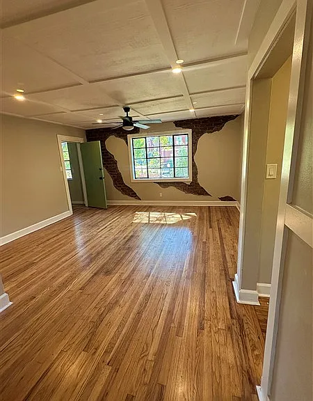 Original ceiling finish and artsy brick plaster wall. Brand new paint and lighting everywhere.