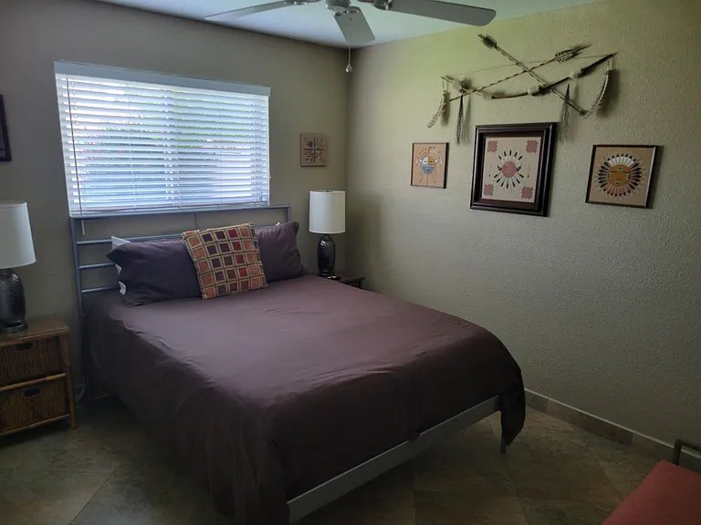 Queen bed in 2nd bedroom.