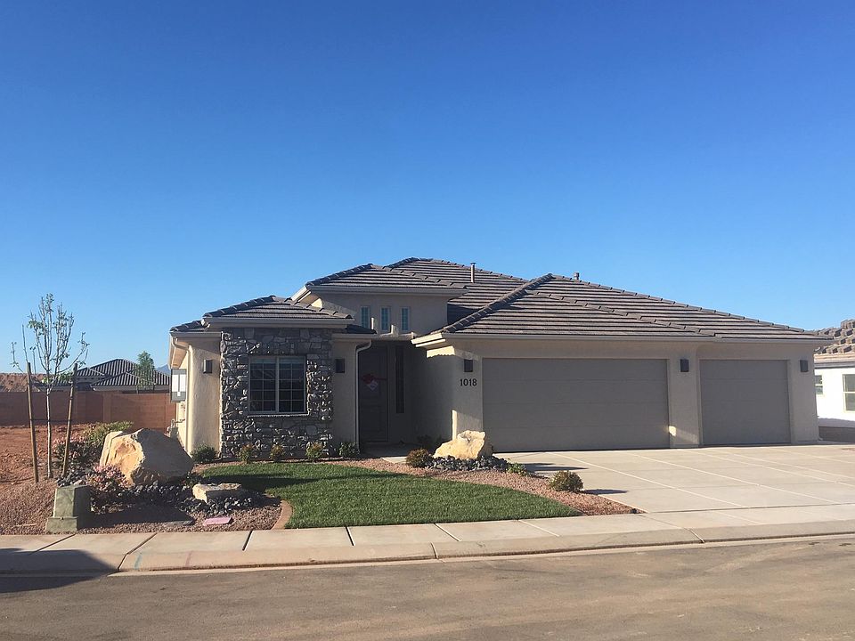 New home with 3 car garage.
