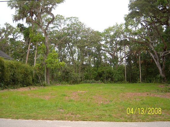 looking west across the lot from the street