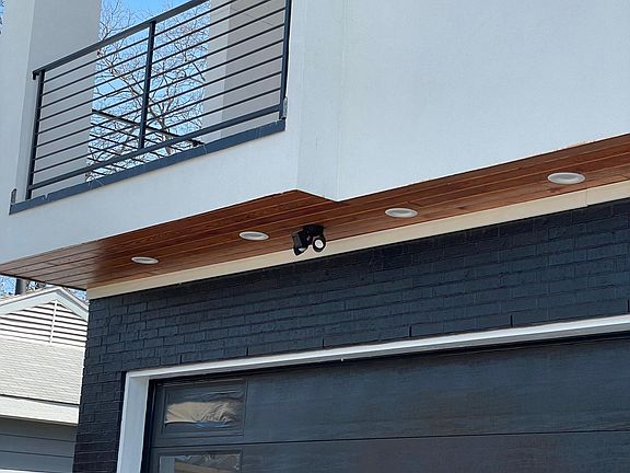 DETAIL OF UPPER BALCONY AND GARAGE