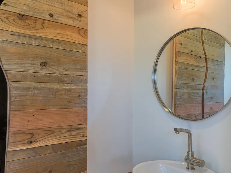 Main floor powder room and utility closet