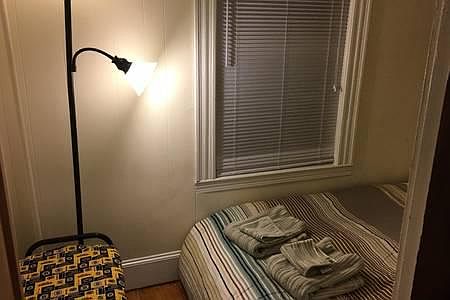 Aother bedroom on 2nd floor with double bed facing street- would be better with single bed
