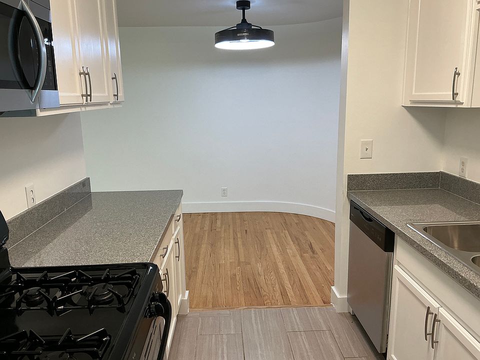 Recently upgraded kitchen with lots of counter space and an upgraded ceiling fan in the dinning area.