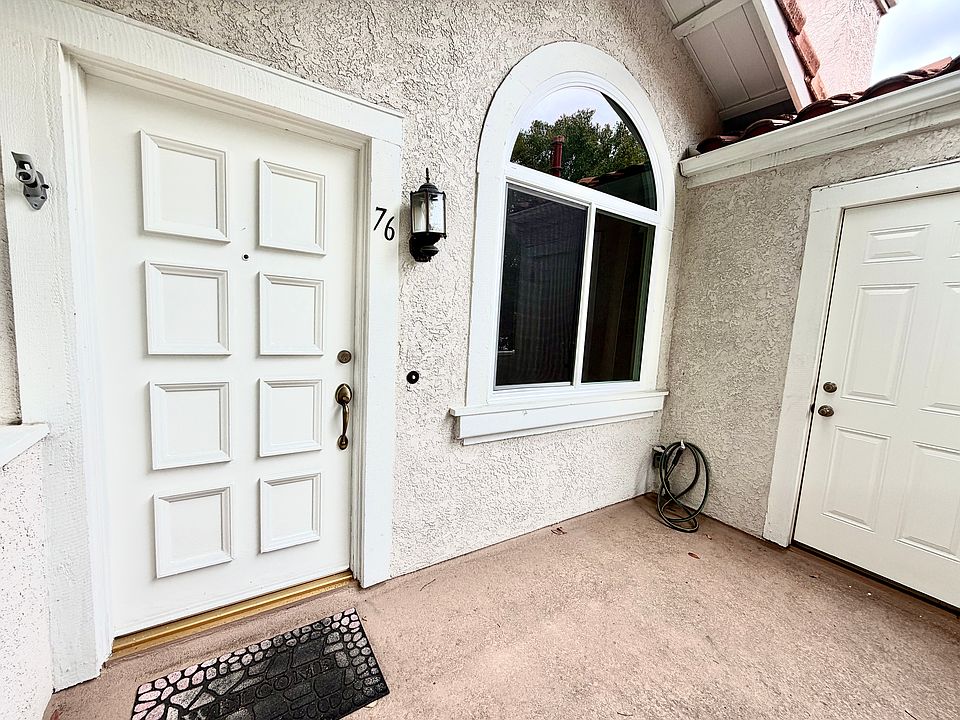 Front desk entrance, storage to the side large dual pane windows.