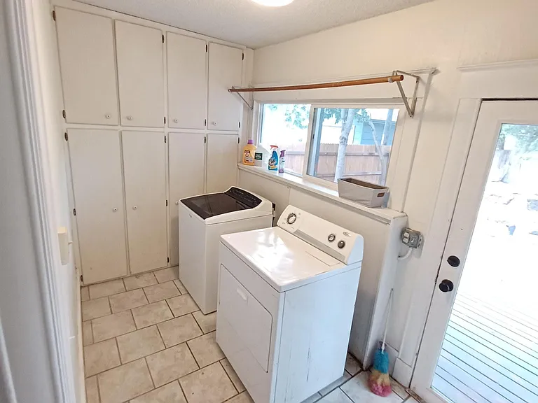 full-size wash machine and dryer provided