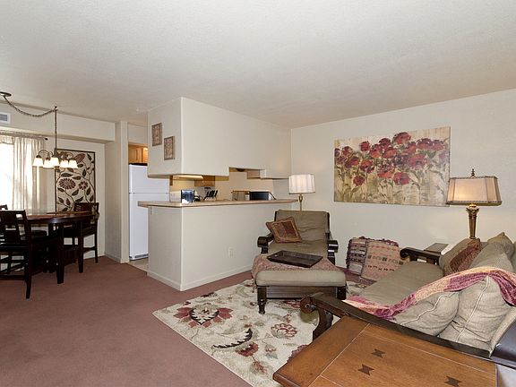 View of Living Room, Kitchen & Dining Room from Entry.
(Furnishings Not Included)