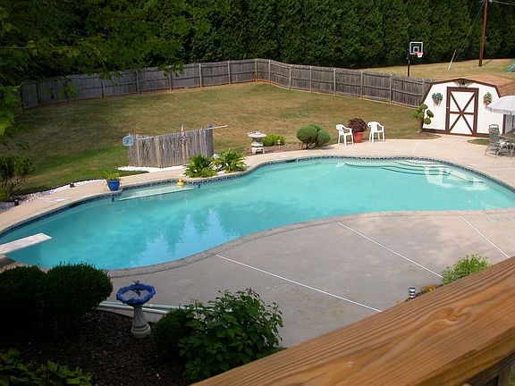 Sylvan Gunite pool w/jetted loveseat