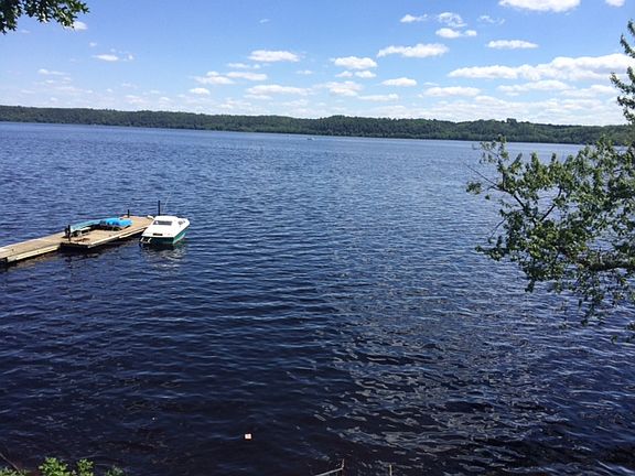 Boats and dock not included.