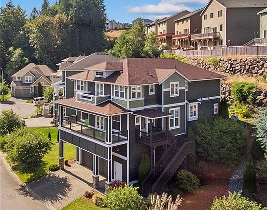 Tumwater Hill Home with territorial views.  Covered balcony  off formal living room and private sun balcony off the master bedroom offer  views of morning sunrises!