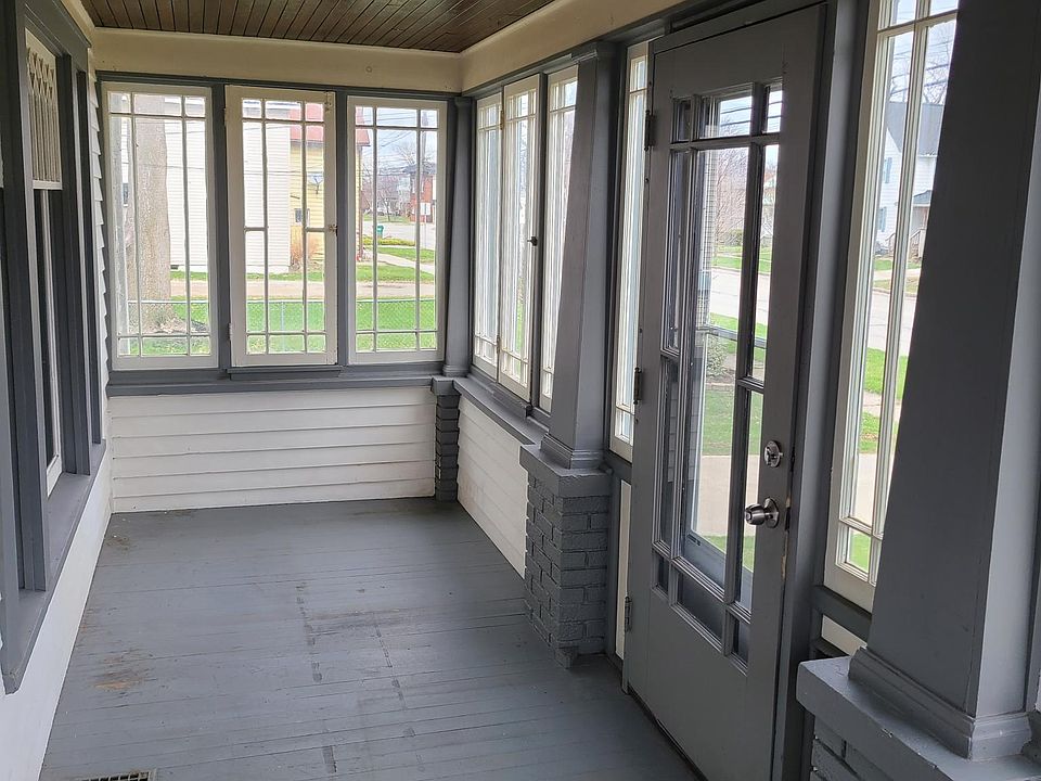 Enclosed front porch.