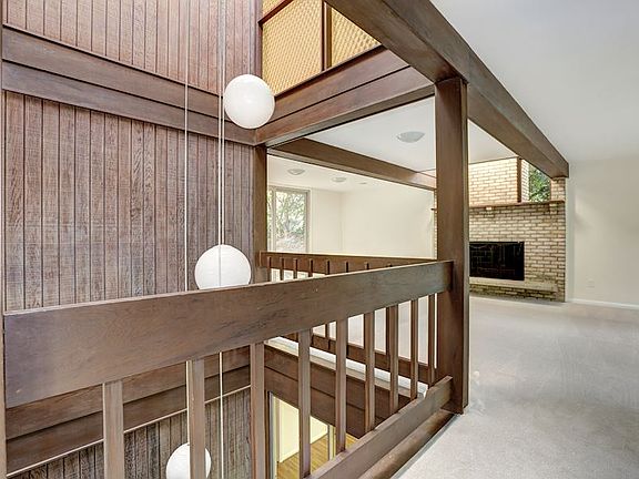 Living Room and Opening to 3-Story Atrium