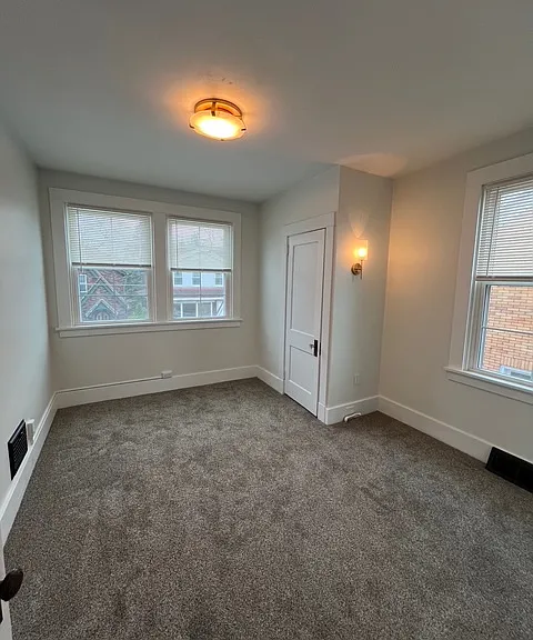 Spacious bedroom including 2 closets, updated paint and brand new lighting.
