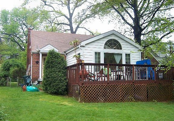 Back of house with Extension and deck