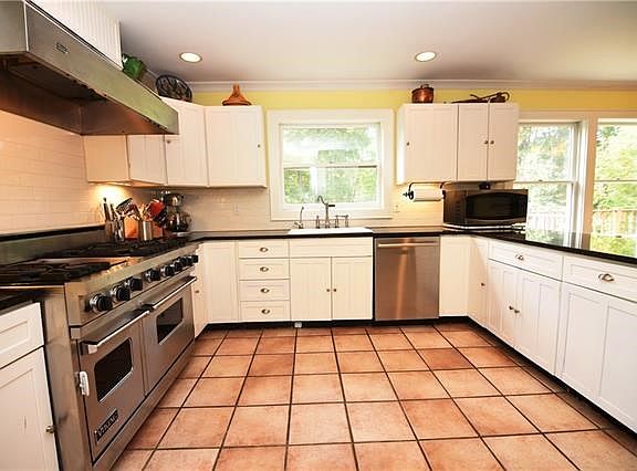 Open Kitchen is perfect for entertaining.  Especially nice with the 6-burner Viking stove and Sub-Zero refrigerator.