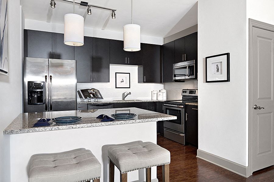 Granite countertops with subway tile backsplash