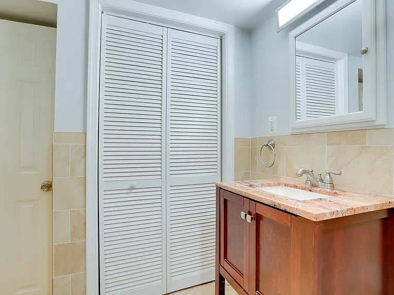 Closet in basement bathroom
