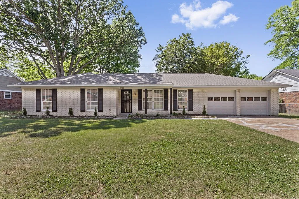 Charming Single-Story Brick Home with Modern Comforts — Photo 1