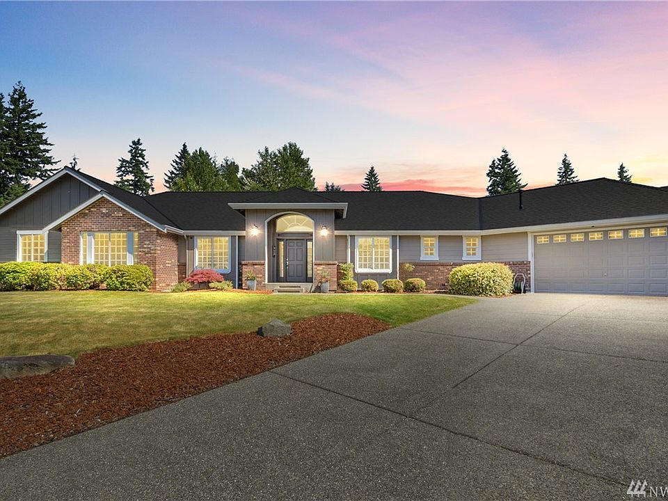 Welcome to this gorgeous, custom built rambler just minutes from the Mill Creek Town Center!