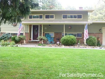 Sit on the porch and enjoy the views of your beautiful front yard