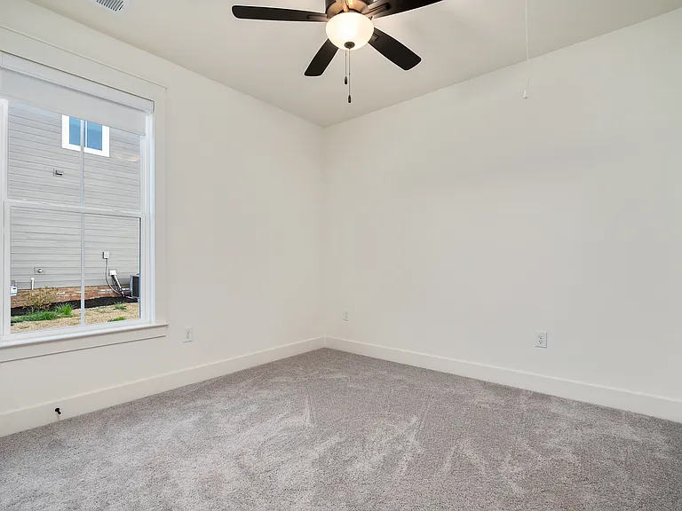 One guest bedroom located at the foremost part of the home share a full bath. Comes with black-out pull-down blind.