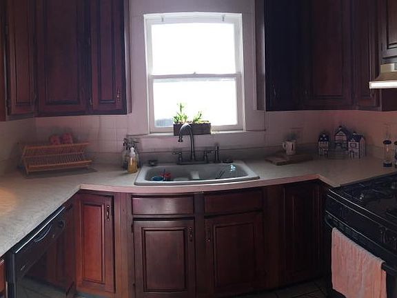 Kitchen includes dishwasher, oven/range, microwave, refrigerator/freezer, breakfast-nook and eat-up bar.