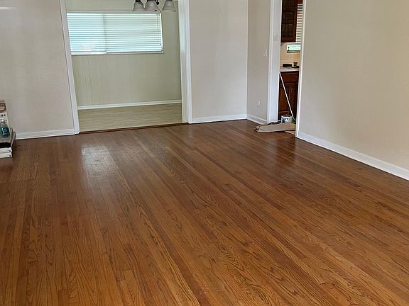 View from front door. Living room, dining room, doorway to the office and doorway to the kitchen