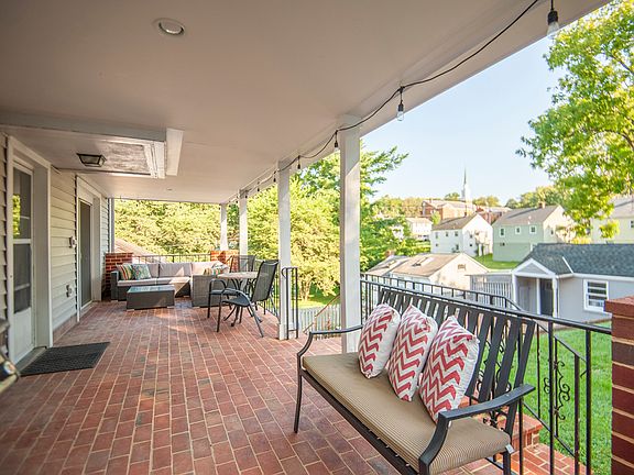 Large covered back porch. Outdoor sectional included.