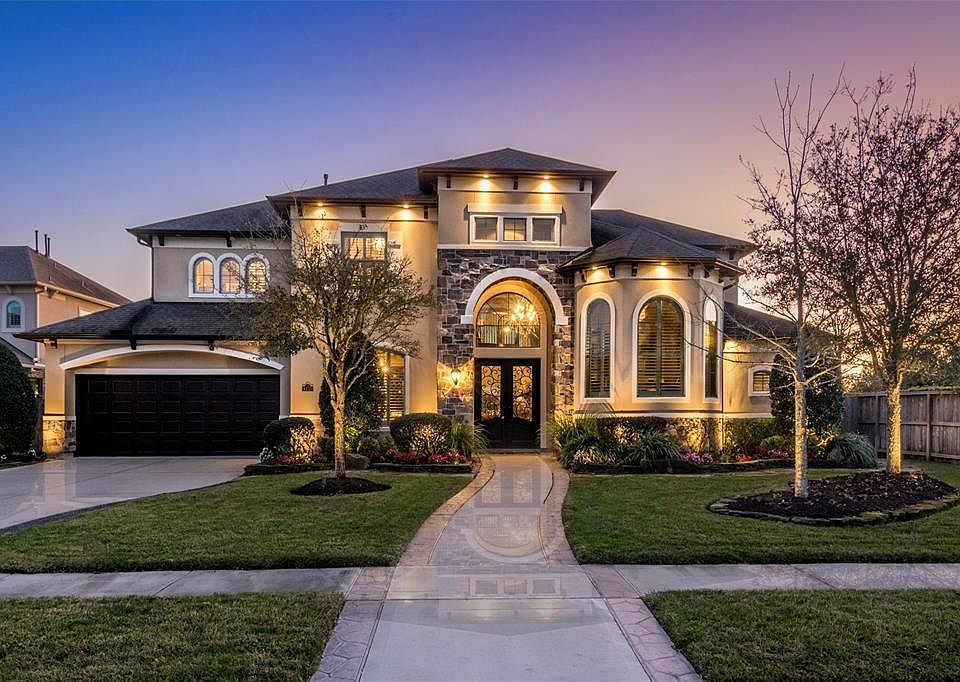 Welcome to this absolutely stunning 5 bedroom, 4 full & 1 half bath custom home located in sought-after Friendswood.