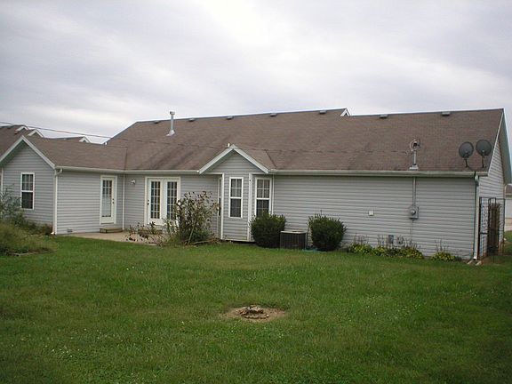 The large back yard is fenced.