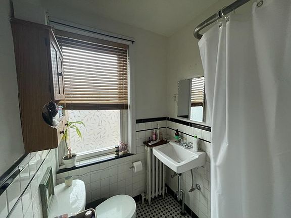 Bathroom, 2024.Who doesn't love a nice tub with great black and white tiles ?!