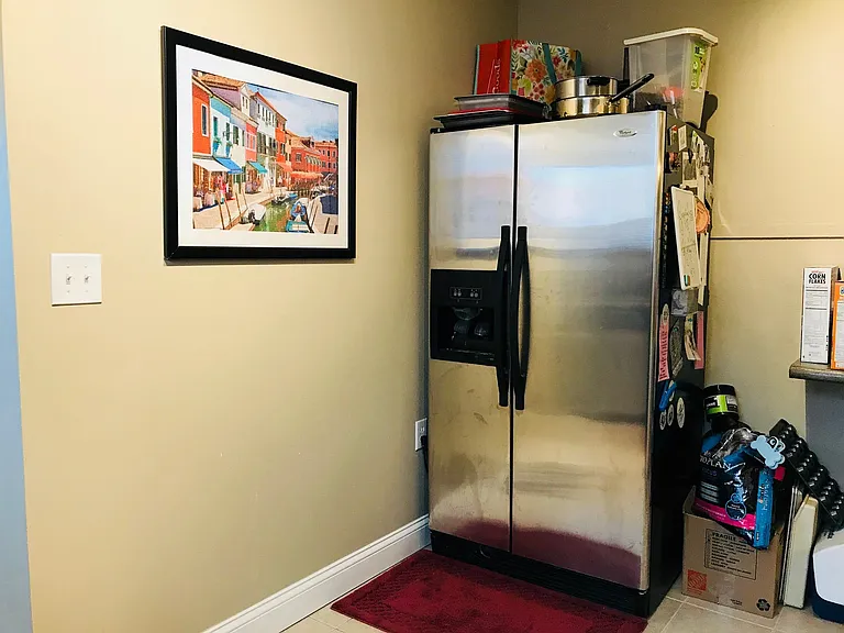 Fridge with water and ice dispenser.