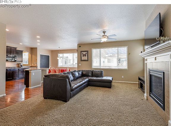Great room opens to the kitchen and dining