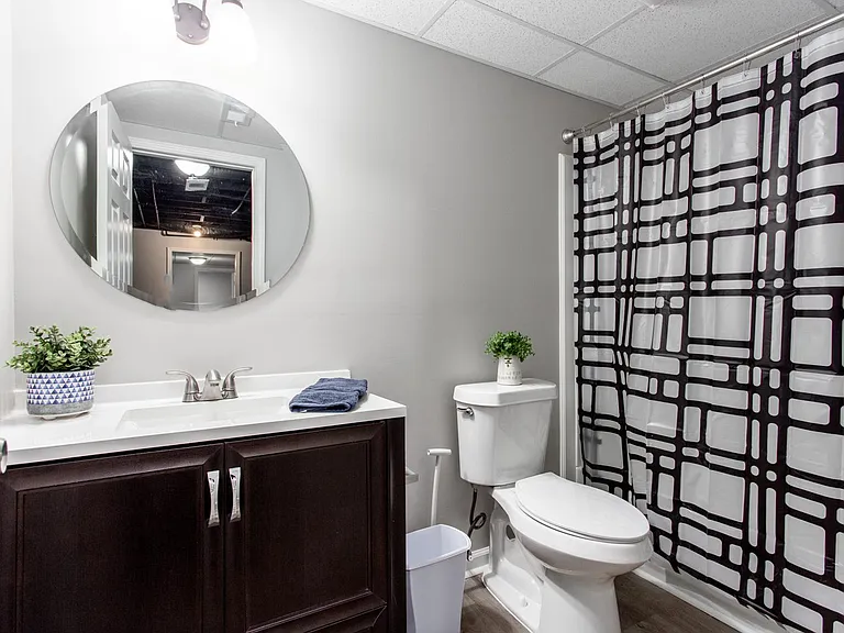 Shared bath with tub/shower combo.