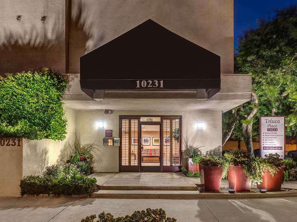 Apartments in Toluca Lake Night Time Exterior Close Up View of Apartment Community Main Entrance Sign.