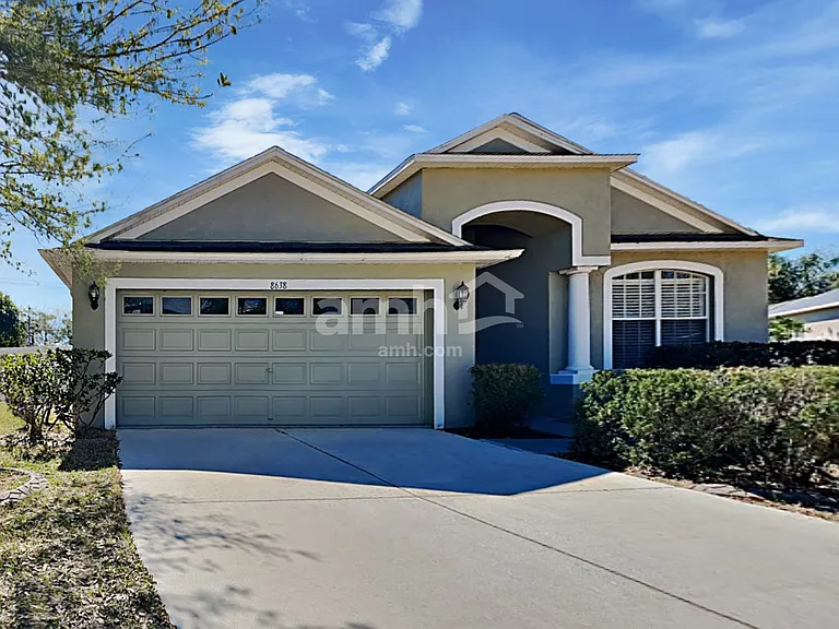 8638 Sandy Plains Dr — Photo 1