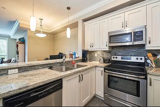 13897 Fraser Hwy #302 — Photo 2