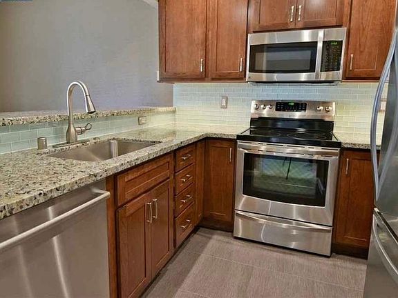 Kitchen, with stove, oven, microwave and dishwasher