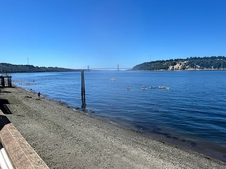 View from beach at low tide to Narrows Bridge. Hike to Pt. Defiance park and forest.