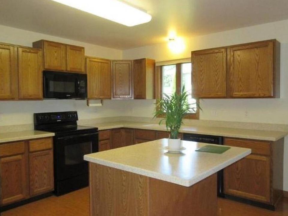 Updated appliances, counters and large pantry.