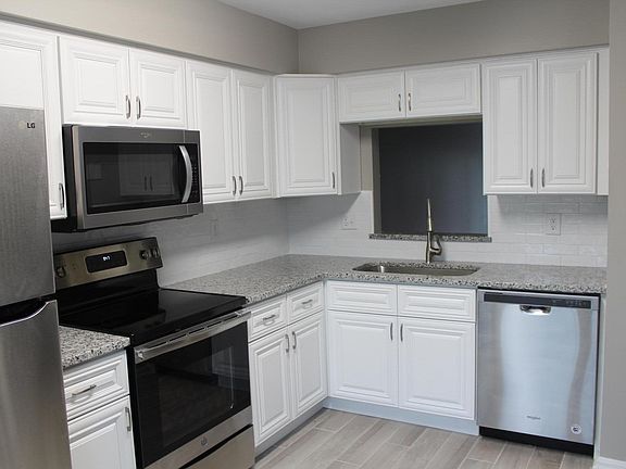 New Counters, Granite, Tile Backsplash, All New Stainless Steel Appliances, Wood Look Porcelain Tile Flooring