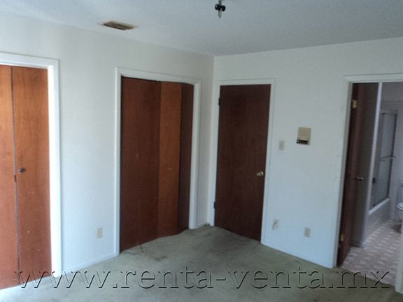 bedroom #2 with 2 closets and shared bathroom