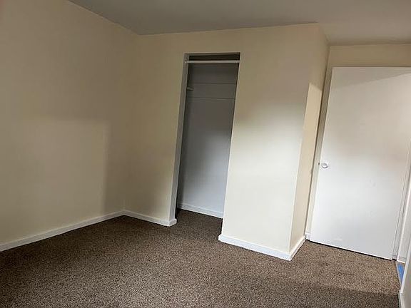 bedroom with closet, new carpet