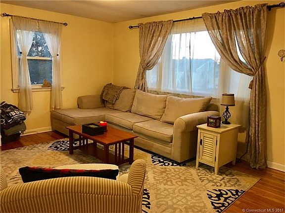 living room with hardwood f...