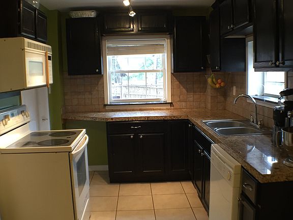 Spacious Kitchen, Tiled Floor, Granite Counter Tops