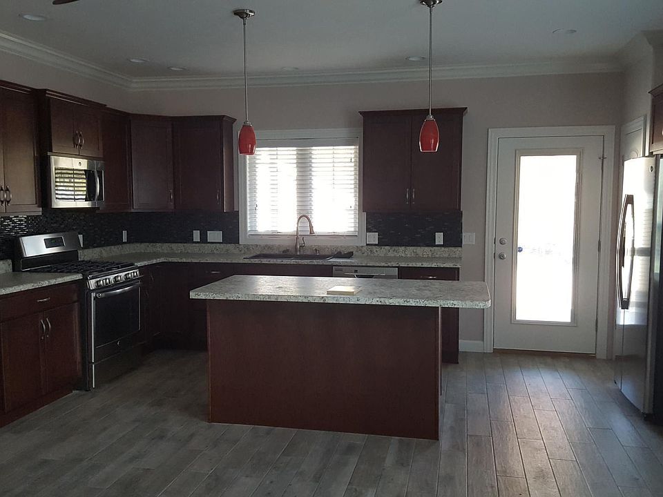 Kitchen w/ door to rear deck