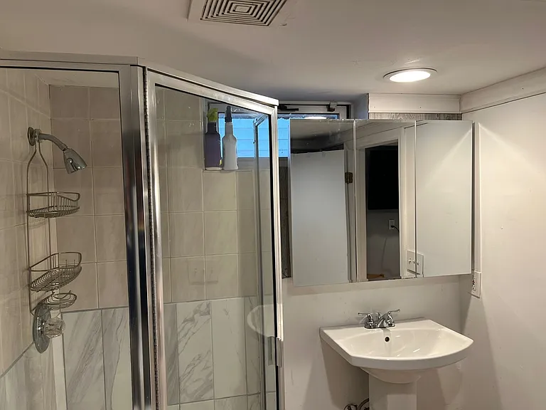 Full bathroom with great water pressure and large hot water heater.