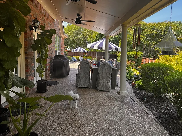Covered porch great for outdoor dining and entertaining