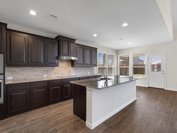 Photos shown here may not depict the specified home & features included are for illustration purposes only