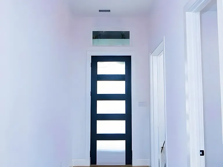 Entryway featuring light wood-style floors and baseboards